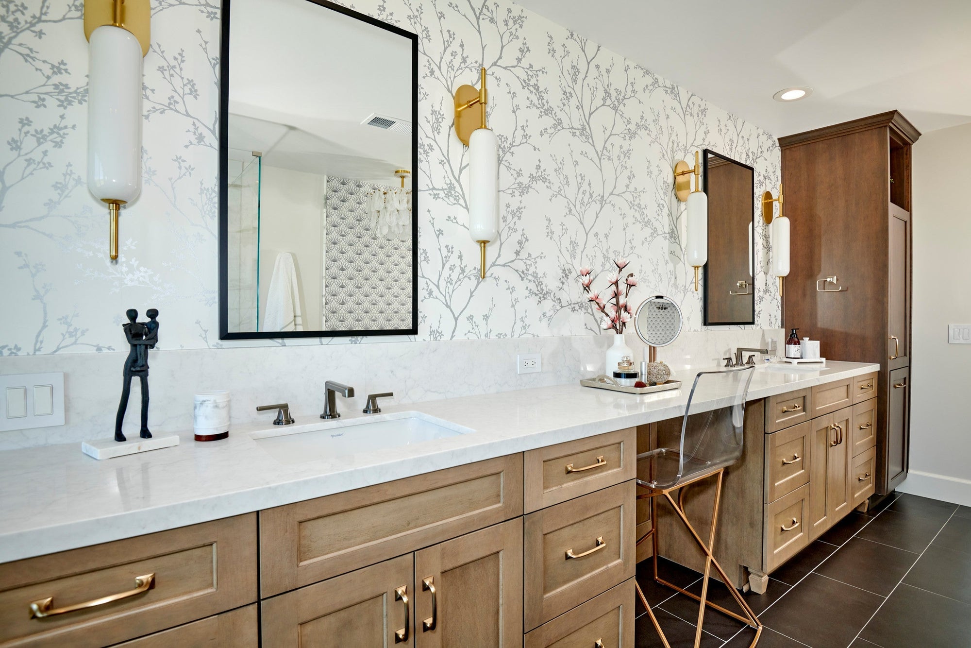A stylish Master Bathroom Vanity with Makeup Area featuring dual sinks, warm wood cabinetry, and a dedicated seated makeup station with elegant gold accents. | ACE DECOR