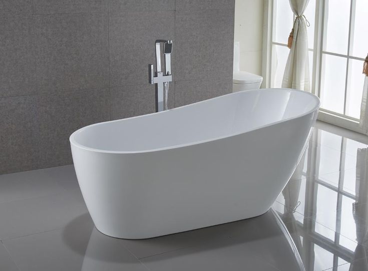 Modern freestanding tub paired with a sleek bathtub faucet hot and cold water lever switch