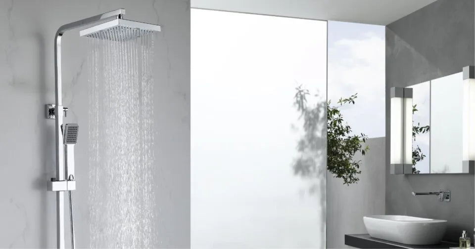 Freestanding chrome best rain shower system in a minimalist modern bathroom with natural light