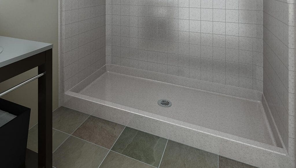 Durable composite shower base materials installed in a tiled alcove shower
