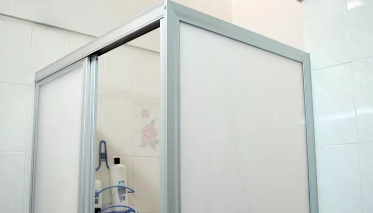 Example of a shower door frame that could be painted following how to paint a shower door frame tips