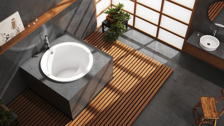 Modern drop-in japanese bathtub in a zen-inspired bathroom with wood slat flooring and shoji screen accents