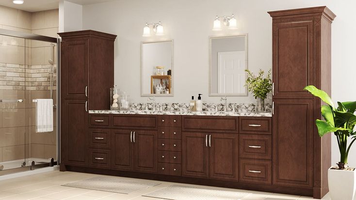 Spacious dark wood cabinet bathroom with marble countertop and ample storage