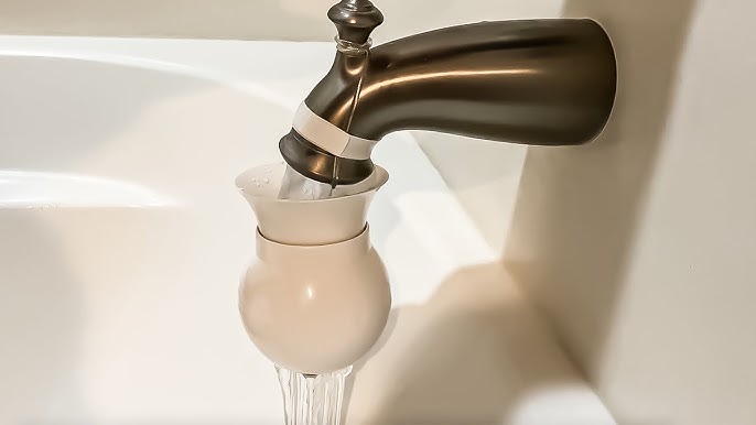 Bathtub faucet filter attached to a modern bathtub faucet, filtering and improving water quality