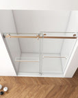 Top view of 60 x 76 frameless shower doors near me with dual sliding glass panels and stainless steel rollers for smooth operation | Ace Decor.