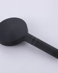 Rear view of the matte black handheld shower head highlighting its smooth, streamlined handle.