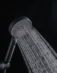 Matte black handheld shower head with a soft, relaxing rainfall spray.