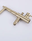 Angled close-up of Brushed Gold Freestanding Tub Faucet with Handheld Shower — solid brass body with diverter valve and single lever control.