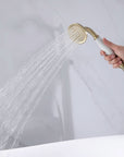Strong water flow demonstration for freestanding tub faucet with white handle.