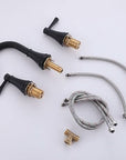 Complete set of VALMIRA Matte Black Sink Faucet with spout, dual handles, hoses, and brass installation parts.
