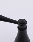 Close-up detail of VALMIRA Matte Black Sink Faucet handle with elegant lever design.