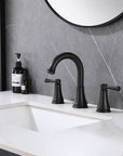 VALMIRA Matte Black Sink Faucet installed on modern bathroom vanity.
