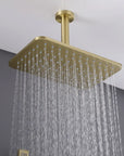 Ceiling-mounted brushed gold rainfall showerhead with wide, even water flow