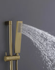 Brushed gold handheld showerhead on the Luxe Series Thermostatic Shower System
