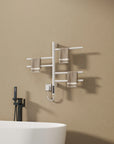 White Orven Series towel rack heater 16 x 27 installed beside bathtub showing space-saving design | Ace Decor