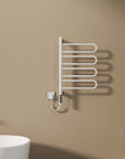 Front view of 17 x 31 electric towel bar warmer in glossy white finish, wall-mounted near bathtub | Ace Decor