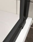 Close-up of Zerra Series pivot shower door bottom water barrier and threshold.