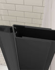 Close-up of Zerra Series matte black pivot shower door magnetic closure seal.