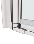 Bottom close-up of semi-frameless pivot shower door with chrome frame | Ace Decor