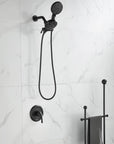 Dorian Series matte black dual-function shower set installed on a white marble tile shower wall.
