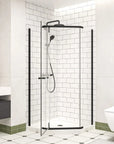 Sleek matte black semi-frameless shower enclosure in a modern bathroom, offering a minimalist and stylish design.