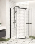 Open matte black shower enclosure in a modern bathroom, showcasing the minimalist design and spacious entry.