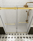 Top view of frameless shower door 60 x 74 with gold hardware in tiled bathroom | Ace Decor