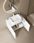30 inch bathroom vanity with ceramic sink and marble countertop in a modern bathroom setting.