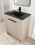 30 inch bathroom vanity with top angled view showing black integrated sink and freestanding cabinet | Ace Decor