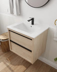 24" bathroom wall mount vanity in modern bathroom setting with light oak cabinet and black faucet | Ace Decor