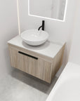 Modern bathroom setup with 30" single vessel sink vanity, floating oak cabinet and round ceramic basin | Ace Decor