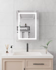 Orren 20 x 28 inch smart LED medicine cabinet installed above vanity in modern bathroom, illuminated mirror front.