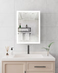 Calvante 28 inch LED mirror cabinet with anti-fog feature, clearing steam for clear reflection over vanity sink.