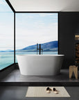 Modern Acrylic Freestanding Soaking Tub with Chrome Overflow and Drain color: Glossy white