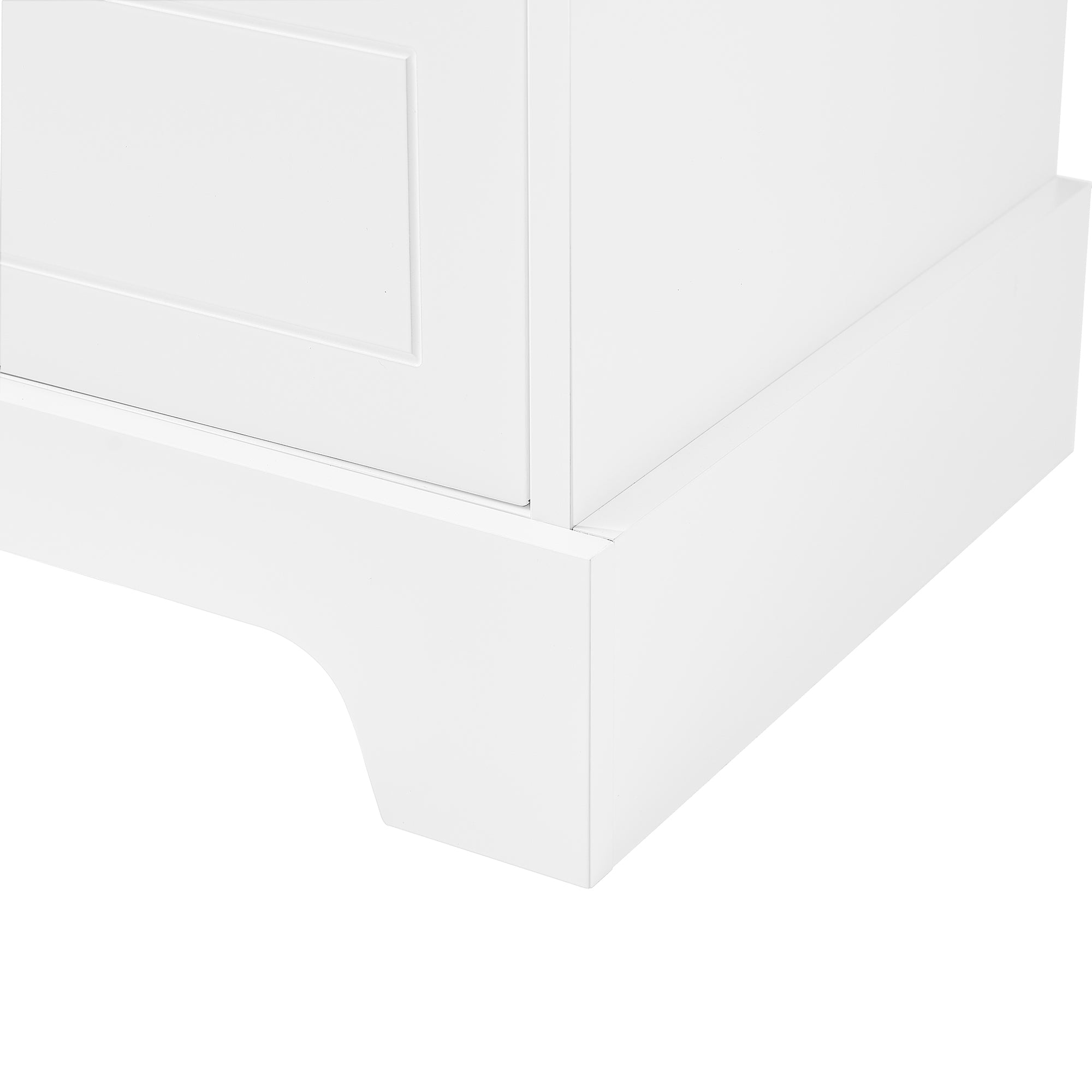 Close-up of sturdy cabinet base and foot design on tall white bathroom linen cabinet.