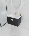 28 inch walnut floating vanity mounted in a modern bathroom setting with brass round handle | Ace Decor