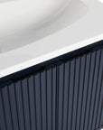 24"–48" Navy Blue Floating Bathroom Vanity with Drop-Shaped Sink & Grille Cabinet Doors