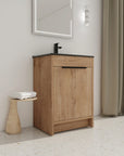 24" black bathroom sink vanity styled in modern bathroom setting | Ace Decor