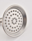 Close-up of the Avelar handheld shower head showing its easy-clean silicone nozzles that prevent limescale buildup.