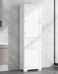 White Valmor 68.1" Bathroom Linen Cabinet placed in modern bathroom interior with sink and marble wall.