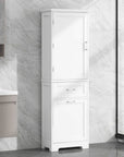 White Valmor 68.1" Bathroom Linen Cabinet placed in modern bathroom interior with sink and marble wall.