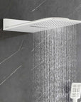 White rainfall shower head producing wide, full-body coverage spray.