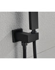 Eclipse Series matte black shower holder mounted on light gray tile, gripping the handheld showerhead