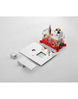 Disassembled shower valve with internal components and chrome control trim