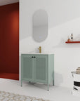 Bathroom scene with 30" mint green 30 inch bathroom vanity with legs, mirror and gold faucet | Ace Decor