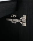 Close up of the soft-close metal hinge on the Noirline Series bathroom wall-mounted vanity in black chestnut.