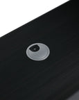 Drain opening on the Noirline Series 36 inch freestanding vanity in black finish.