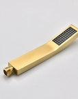 Eclipse Series brushed gold rectangular handheld showerhead with silicone nozzles