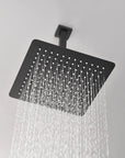 Lorton 12" black rain shower head delivering soft rainfall water flow for a relaxing shower experience.