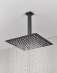 Lorton 12" black rain shower head delivering soft rainfall water flow for a relaxing shower experience.